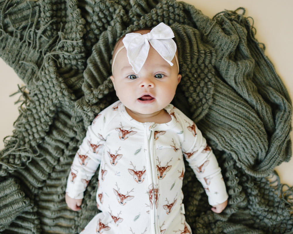 Reindeer Games Ribbed Bamboo Zippy Pajamas for babies NB to 3/6m - cozy sleepwear for a comfortable night's rest.