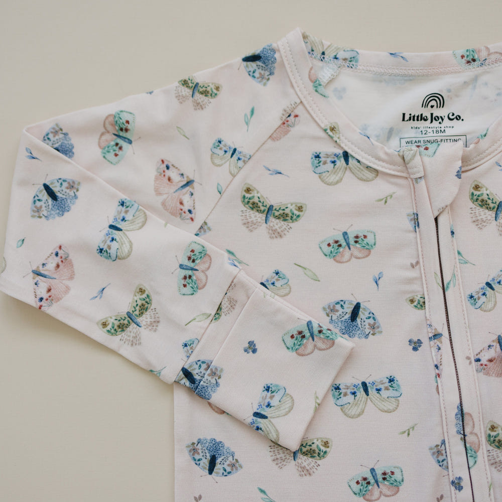 Luna Moths Bamboo Zippy Pajamas for babies, soft and stylish sleepwear in vibrant colors.