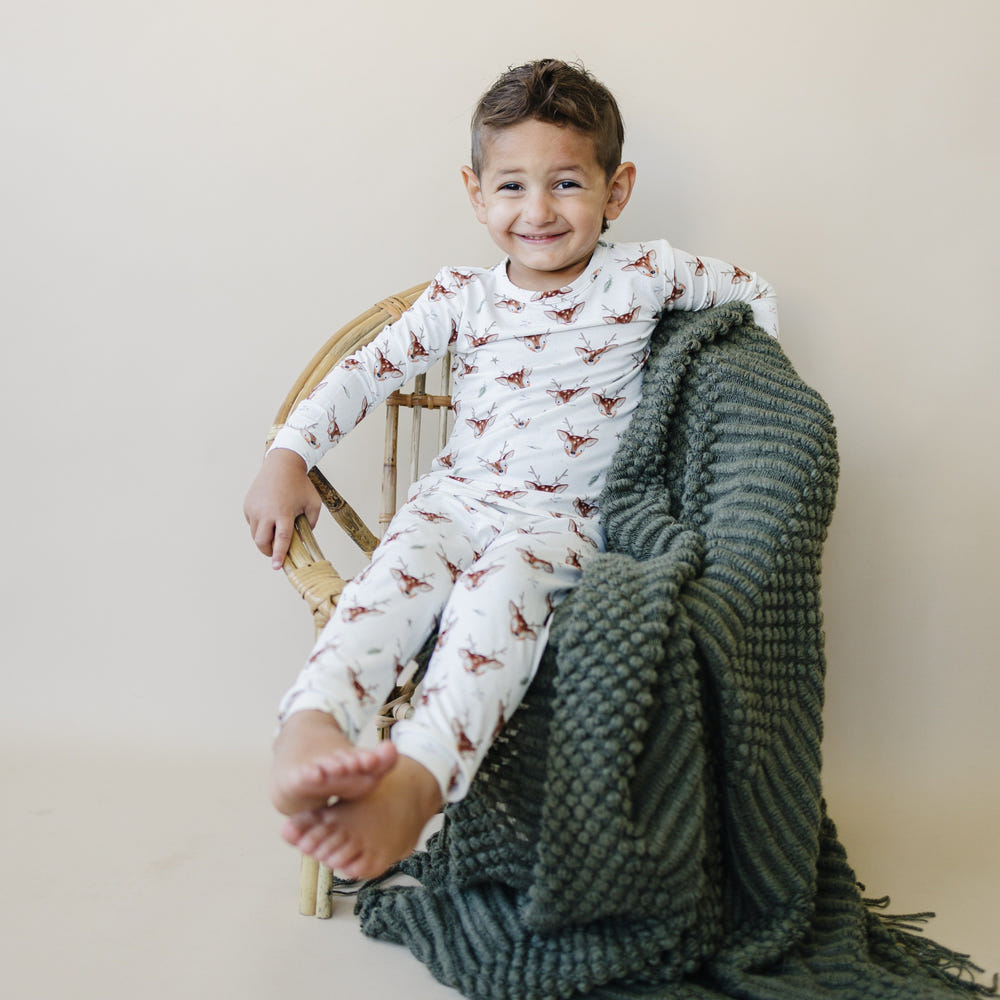Reindeer Games 2pc Bamboo Pajamas for babies, soft and cozy sleepwear in festive design.