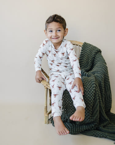 Reindeer Games 2pc Bamboo Pajamas for babies, soft and cozy sleepwear in festive design.