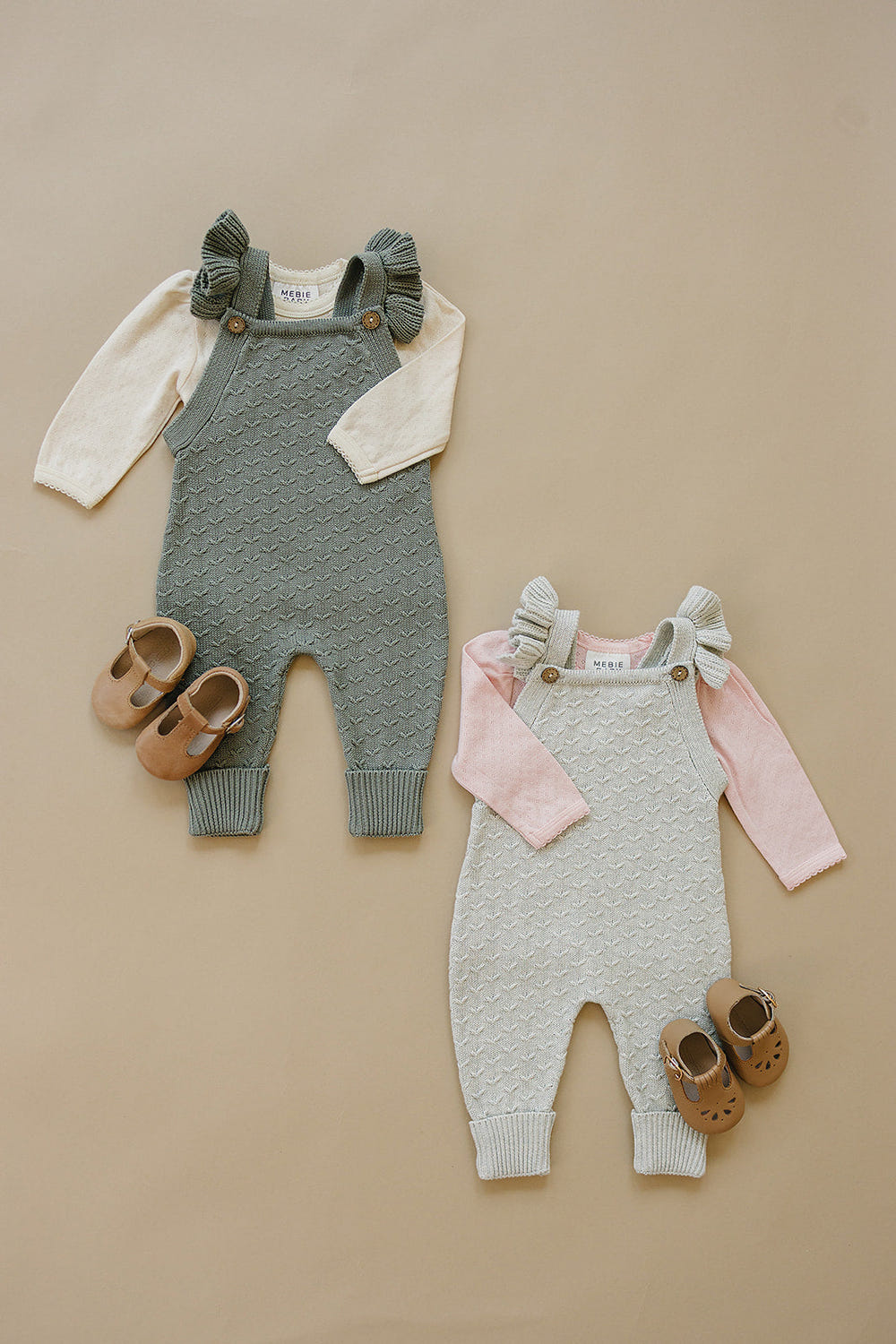 Grey ruffle knit overalls for babies, stylish and comfortable romper for little ones.