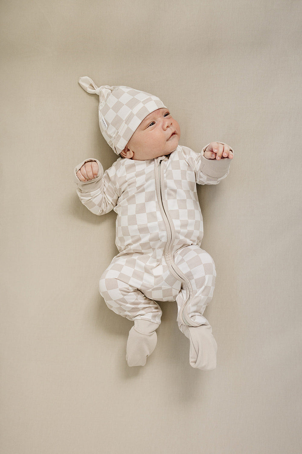 Taupe checkered bamboo zipper diaper bag, stylish and functional for parents on the go.