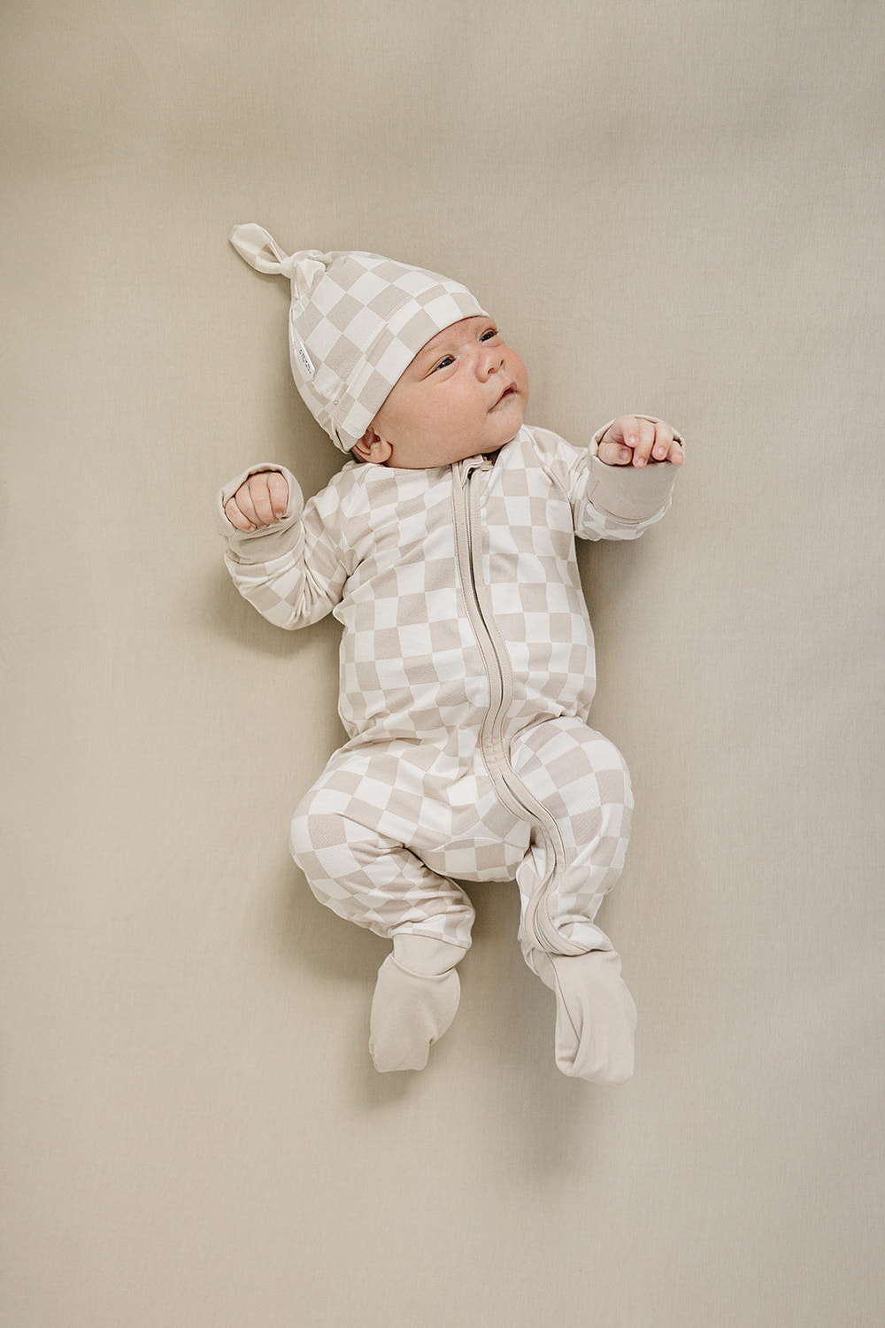 Taupe checkered bamboo zipper diaper bag, stylish and functional for parents on the go.