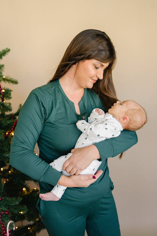 Tiny Trees Ribbed Bamboo Zippy Pajamas for babies, cozy sleepwear in soft bamboo fabric, angle view.