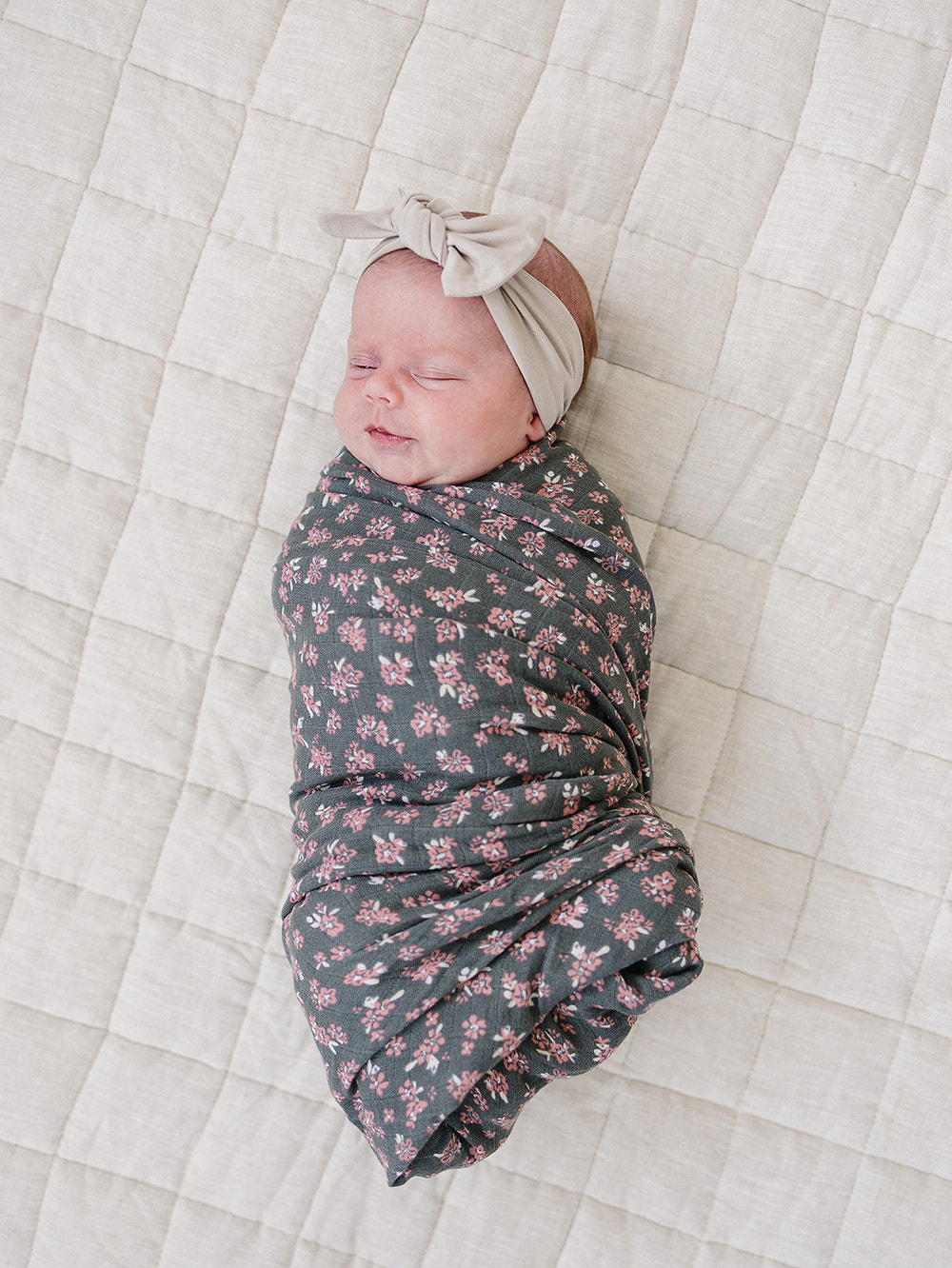 Olive Bloom Muslin Swaddle Blanket - soft, breathable, and stylish for newborns. Perfect for cozy naps and cuddles.