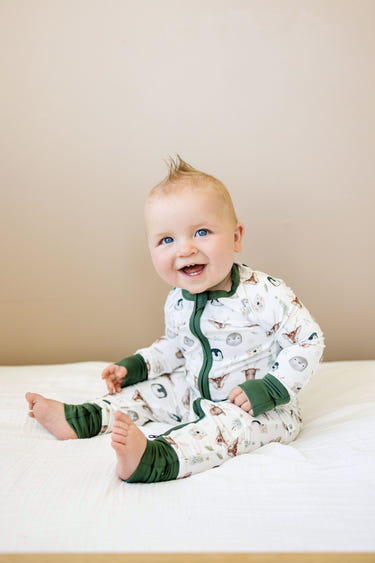 North Pole Pals Bamboo Zippy Romper for babies 0-3 months, soft and cozy, perfect for comfort and style.