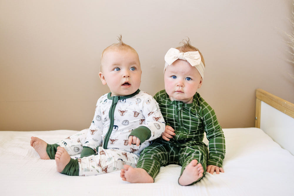North Pole Pals Bamboo Zippy Romper for babies 0-3 months, soft and cozy, perfect for comfort and style.