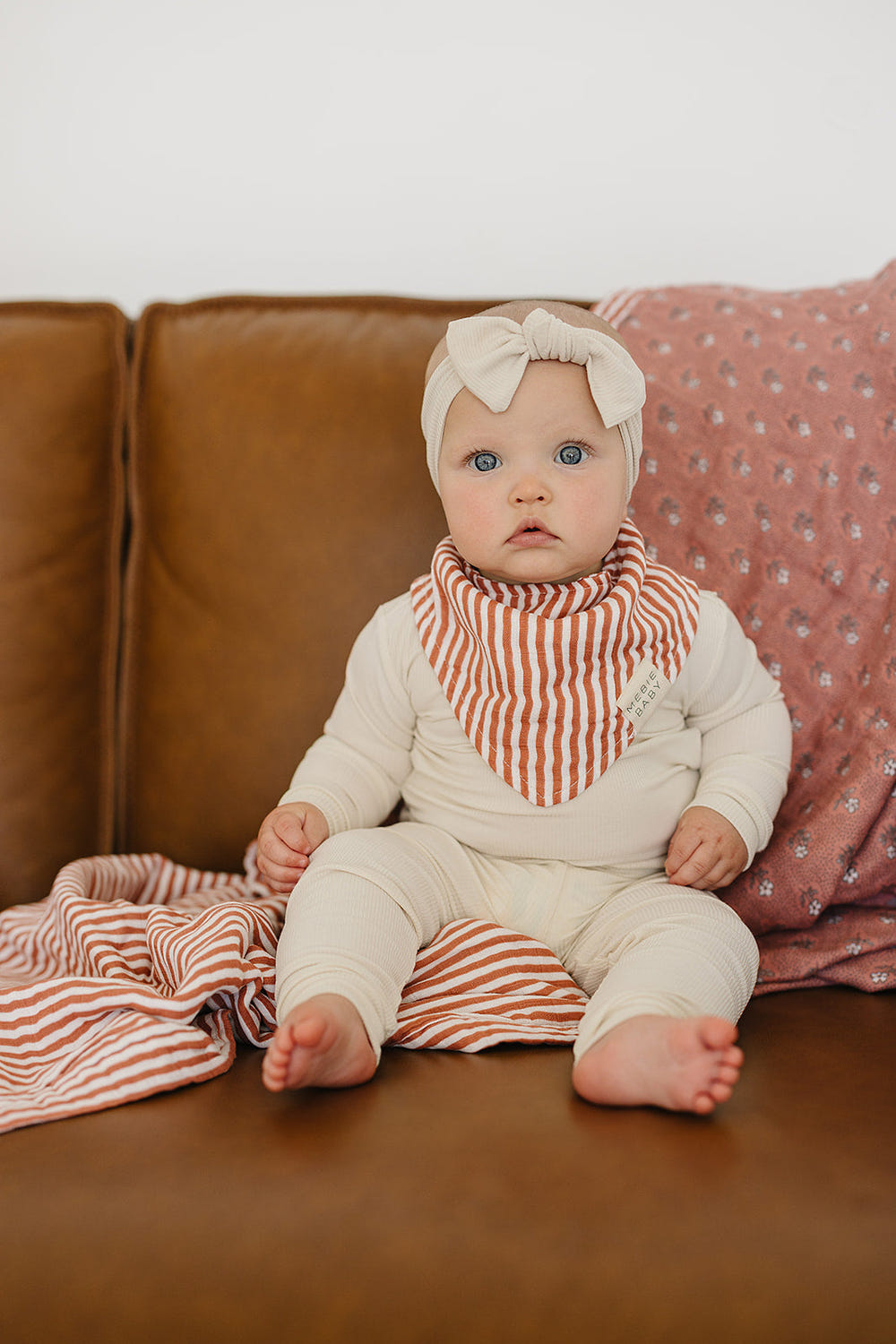 Pink Stripes Classic Muslin Bib for babies, soft and stylish, perfect for mealtime messes.