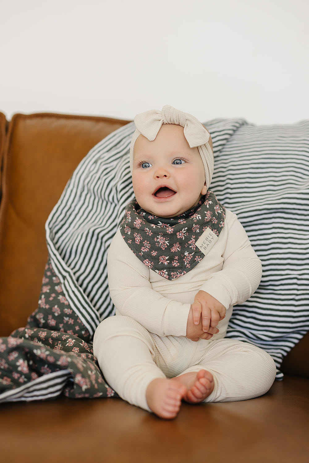 Olive Bloom Classic Muslin Bib in soft fabric, perfect for keeping babies clean during mealtime.