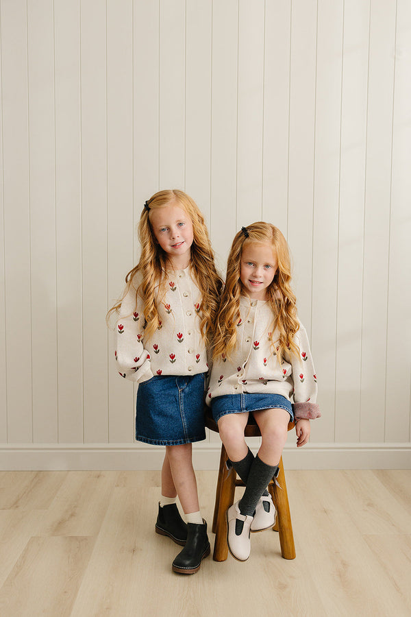 Dark wash denim skirt for babies, stylish and comfortable, perfect for casual outfits. Angle 5 view.