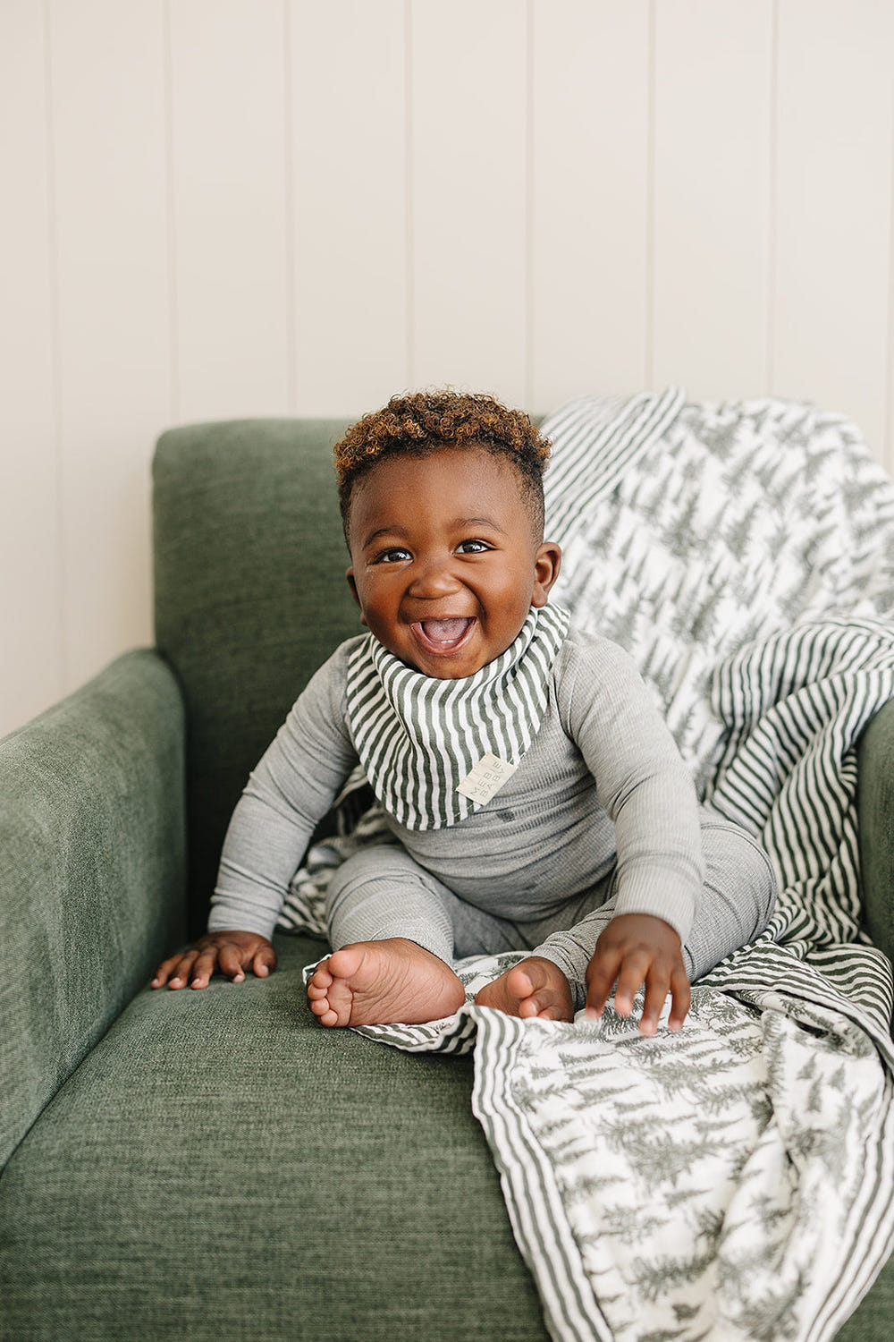 Green Stripes Classic Muslin Bib for babies, soft and stylish, perfect for mealtime messes.