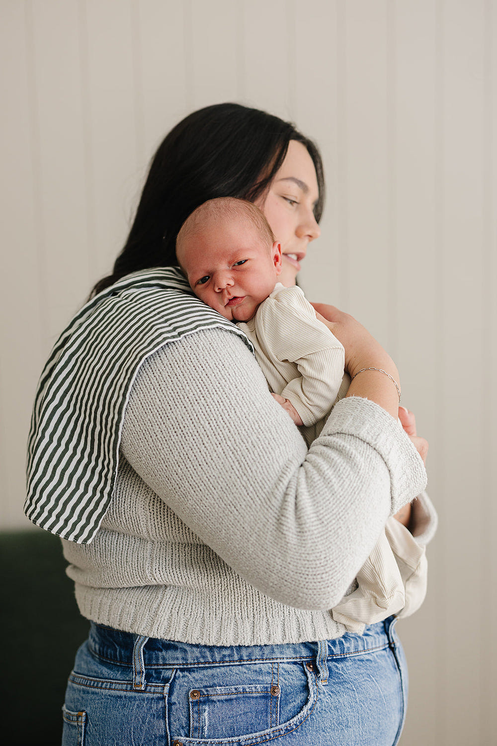 Green Stripes Muslin Burp Cloth for babies, soft and absorbent, perfect for feeding and messes.