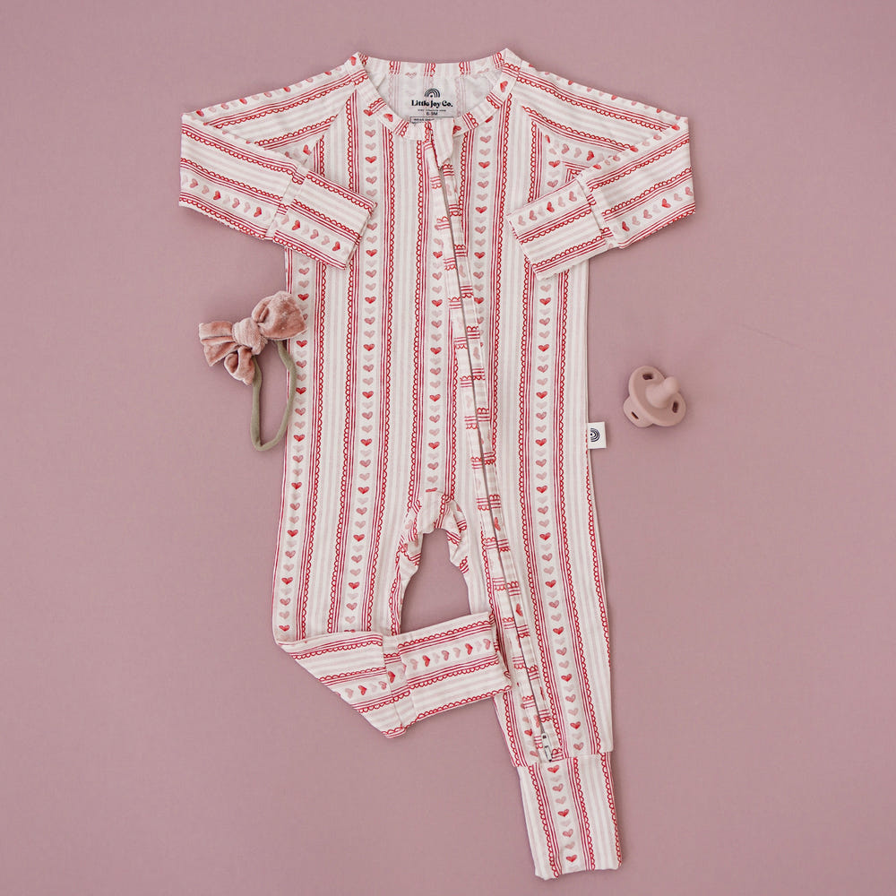 Laced with Love Bamboo Zippy Pajamas for babies in soft, breathable fabric, perfect for comfort and style.