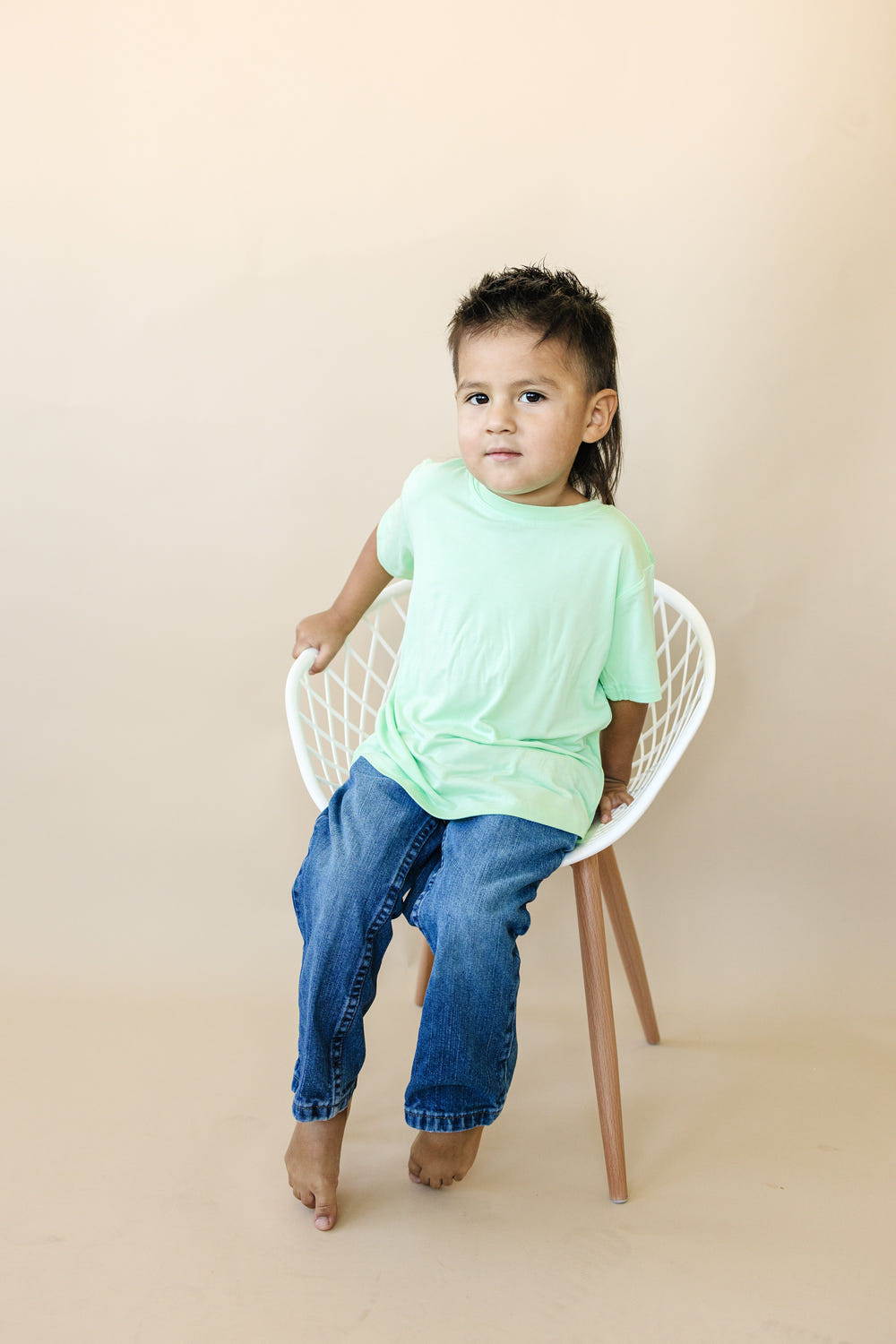 Lime green bamboo tee for babies, stylish and eco-friendly furniture piece for nurseries.