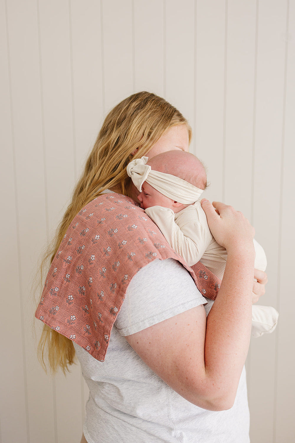 Vintage pink floral muslin burp cloth for babies, soft and stylish addition to blankets and swaddles collection.