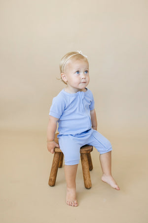 Solid ribbed bamboo shorty romper in various colors, angle view 7, perfect for stylish baby outfits.