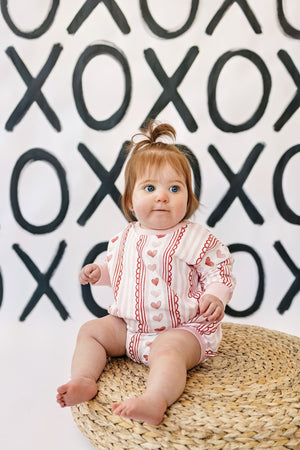 Laced with Love Sweatshirt Romper for babies, stylish and cozy, shown from angle 11.