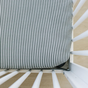 Green Stripes Muslin Crib Sheet for stylish and comfortable baby bedding. Perfect for any nursery decor.