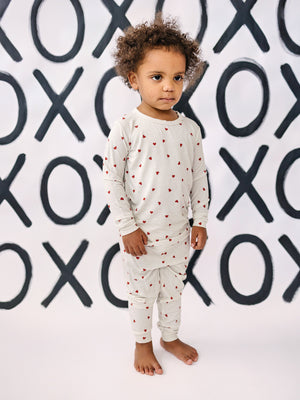 Tiny Hearts 2pc Bamboo Pajamas for babies, soft and breathable bedding for a cozy sleep.