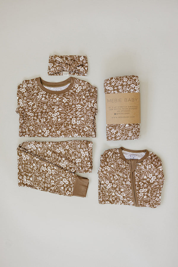 Brown floral ribbed bamboo cozy set for babies, featuring a stylish two-piece design in a comfortable angle view.