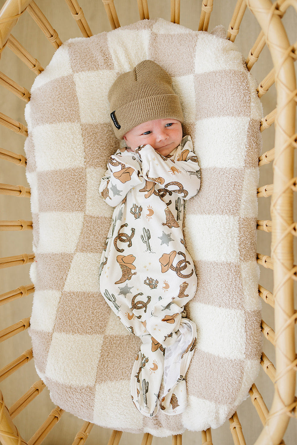 Outlaw Cowboy Ribbed Bamboo Knot Gown for babies, perfect for sleep and comfort in stylish bedding.