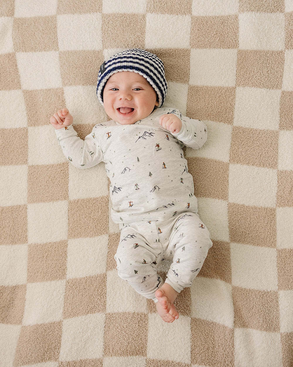 Navy and white stripe chunky knit beanie for babies, perfect for warmth and style.