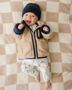 Cozy Sherpa zip-up jacket for babies, showcasing soft fabric and stylish design from angle 4.