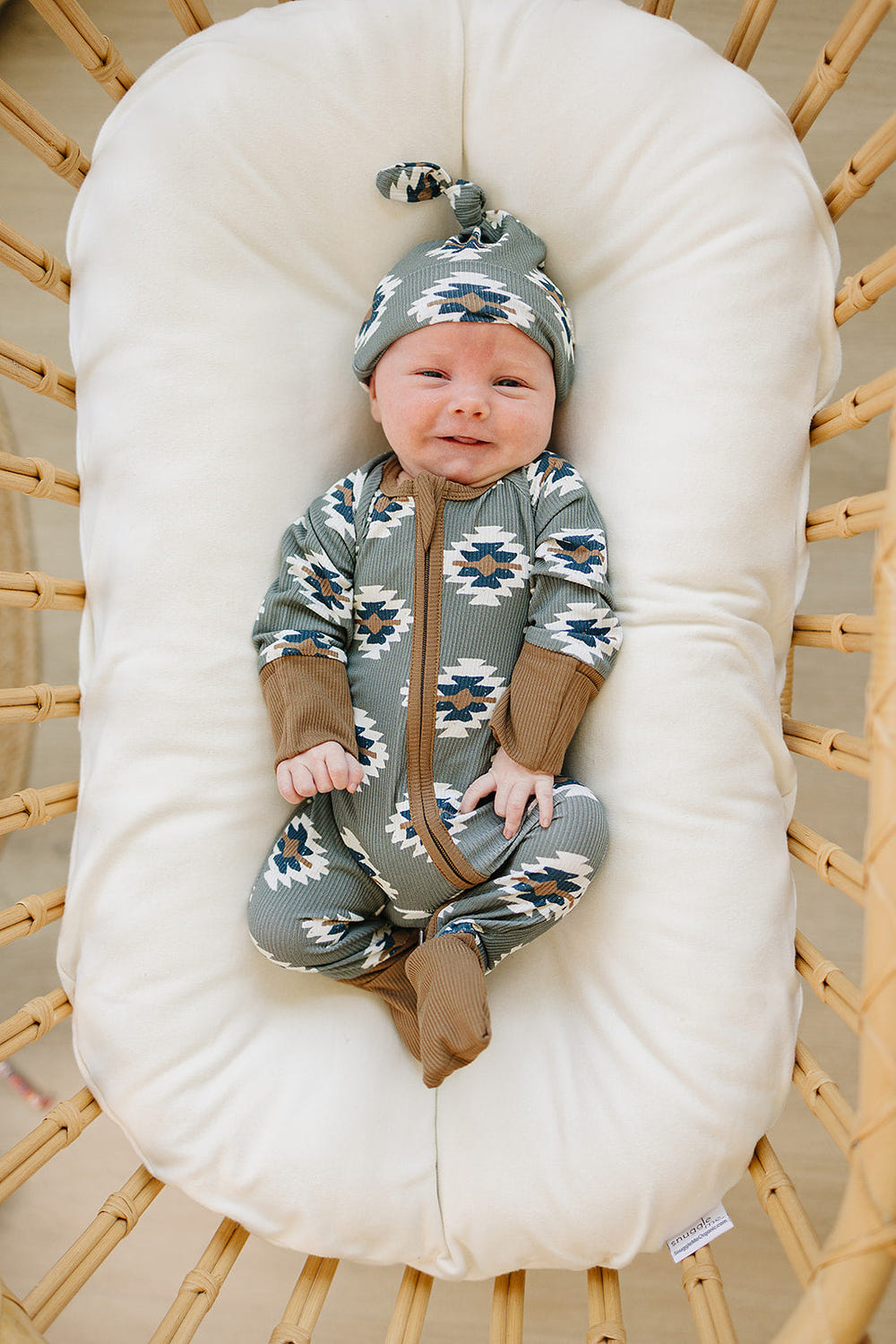 Southwest Aztec ribbed bamboo zipper footie pajamas for babies, featuring a stylish design and soft fabric.