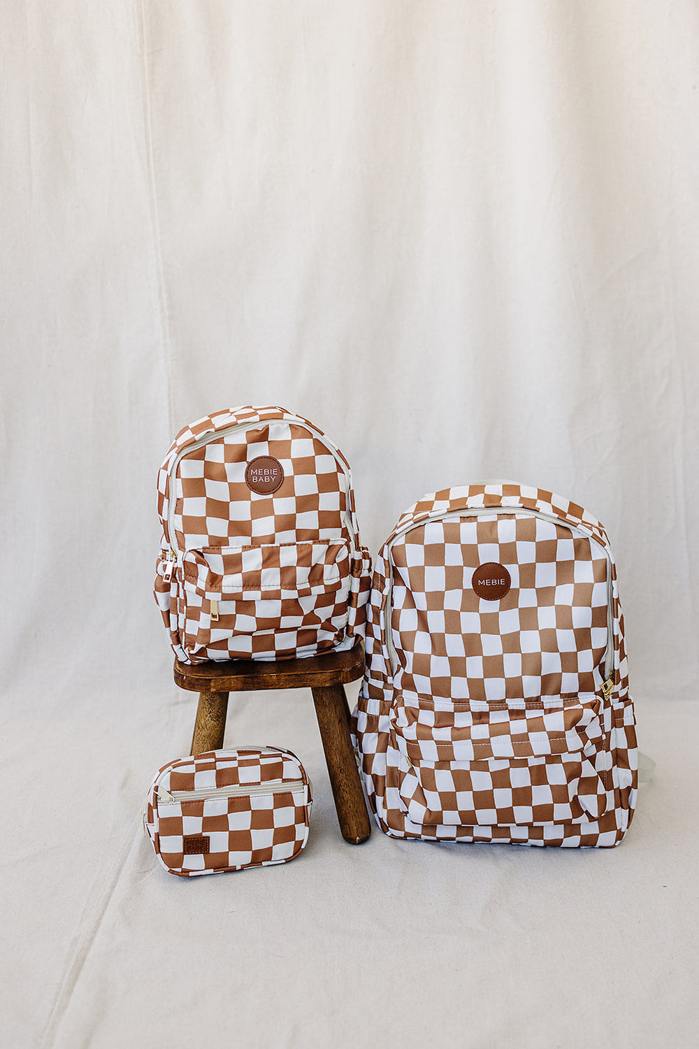 Rust wavy checkered mini fanny pack for babies, stylish and functional accessory for little ones.