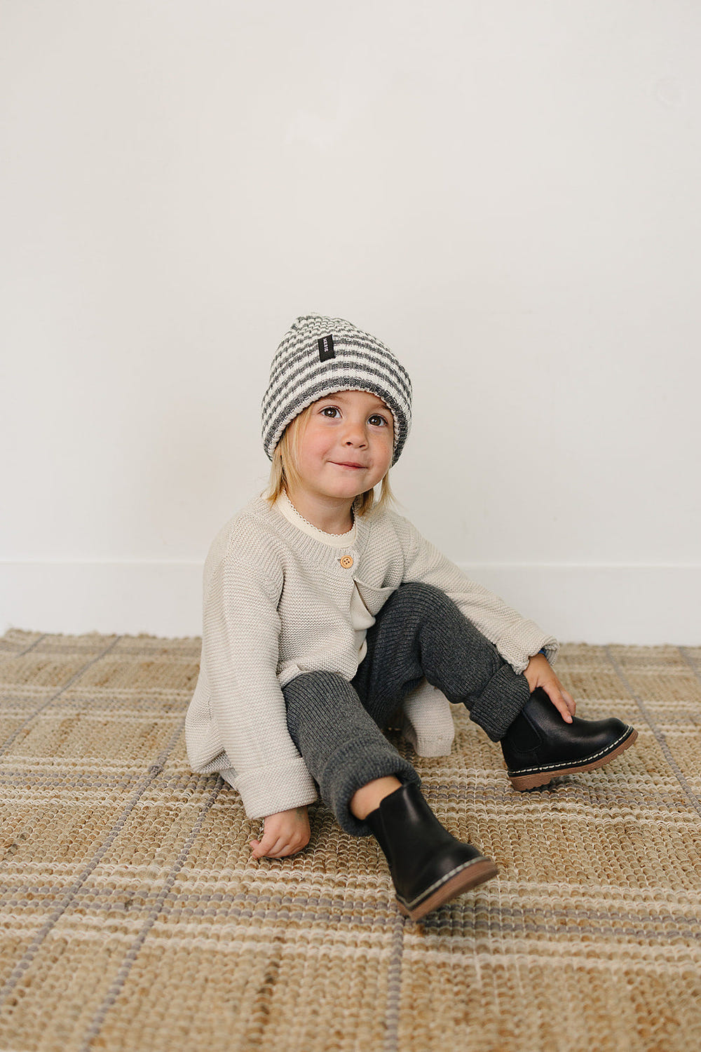 Grey & white stripe chunky knit beanie for babies, perfect for warmth and style in cooler weather.