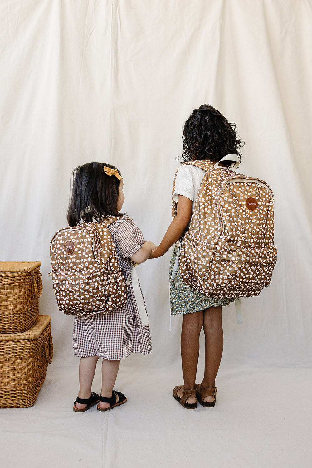 Mustard floral large backpack for babies, perfect for storage and style in nursery furniture.
