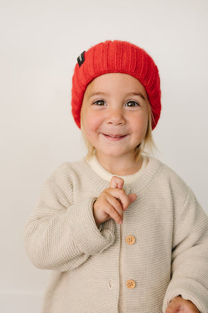 Red chunky knit beanie for babies, showcasing a cozy and stylish design from angle 2. Perfect for warmth and fashion.