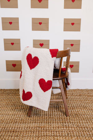 Soft Hearts Plush Blanket for babies, perfect for swaddling and cozy comfort.