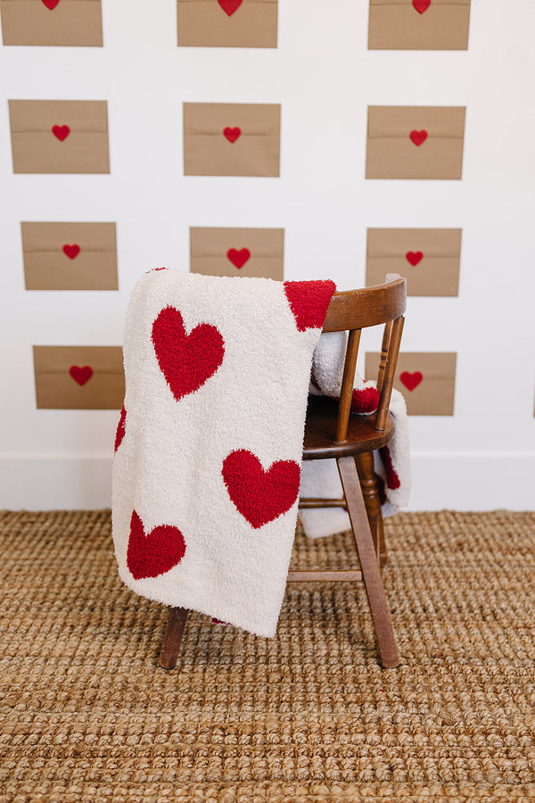 Soft Hearts Plush Blanket for babies, perfect for swaddling and cozy comfort.