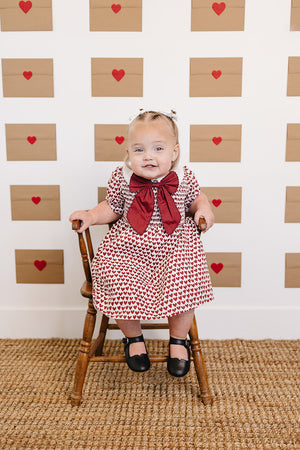 Heart Bow Dress for babies, stylish and cute, shown at angle 5. Perfect for special occasions and everyday wear.
