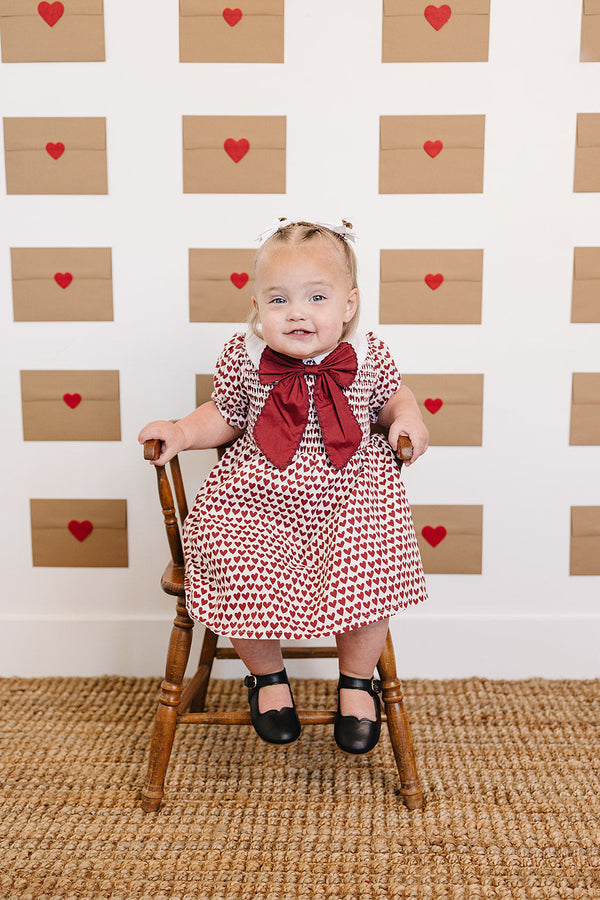 Heart Bow Dress for babies, stylish and cute, shown at angle 5. Perfect for special occasions and everyday wear.
