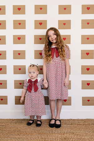 Heart Bow Dress for babies, showcasing a cute design from angle 6. Perfect for special occasions and everyday wear.