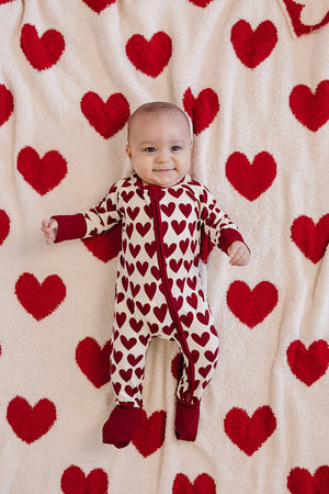 Hearts Plush Blanket for babies, soft and cozy, perfect for swaddling and keeping little ones warm.