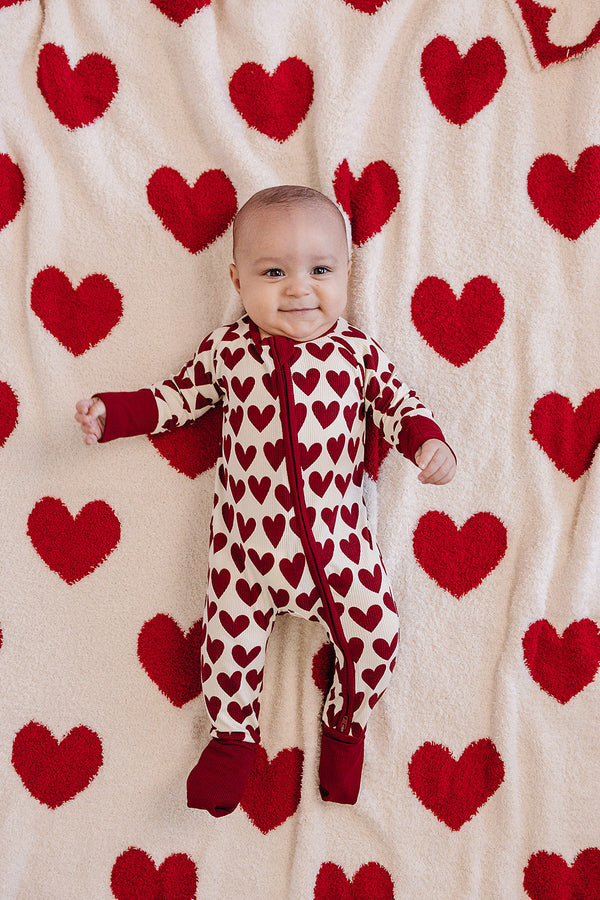 Hearts Plush Blanket for babies, soft and cozy, perfect for swaddling and keeping little ones warm.
