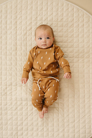"Fall Bolts Jogger Set for babies, showcasing a stylish two-piece outfit from an angled view."