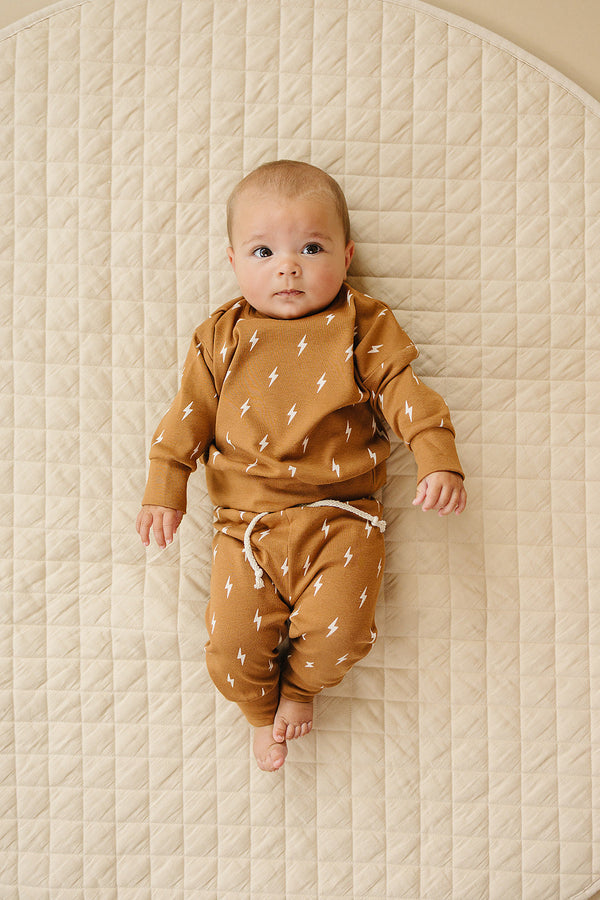 "Fall Bolts Jogger Set for babies, showcasing a stylish two-piece outfit from an angled view."