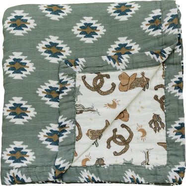 Southwest Aztec Outlaw Cowboy muslin quilt for babies, perfect for swaddling and cozy comfort.