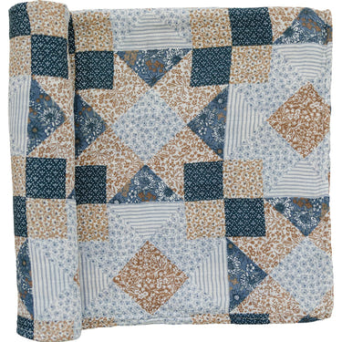Patchwork print muslin swaddle blanket for babies, soft and breathable for comfort and style.