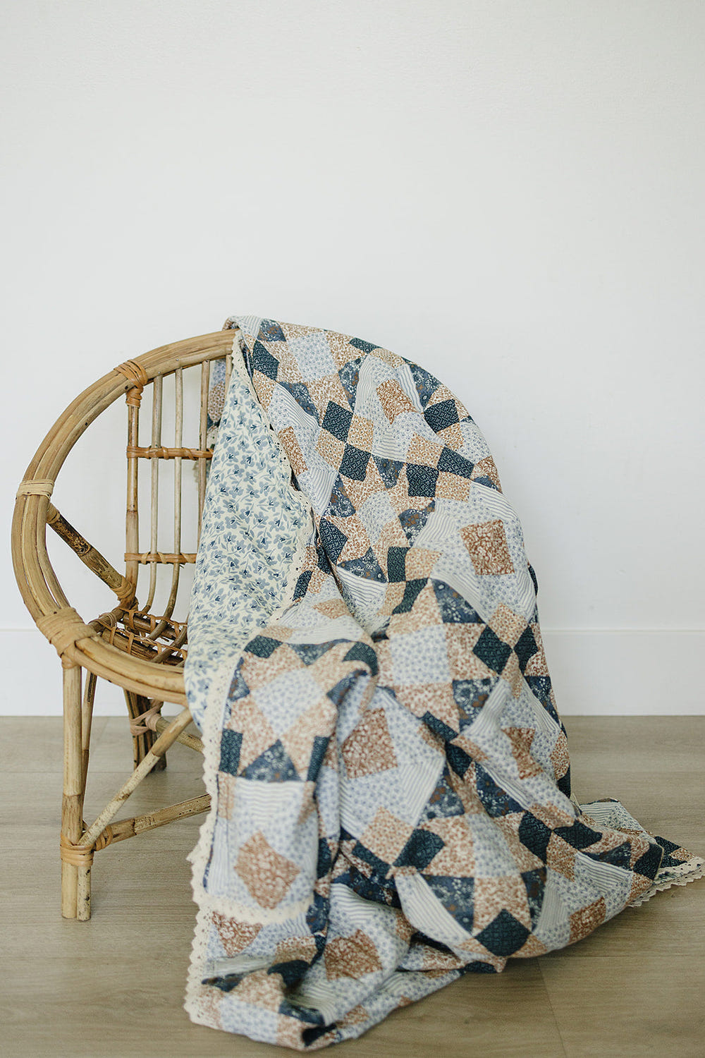 Patchwork Print and Blue Blossom Lace Muslin Quilt for babies, perfect for bedding and sleep.