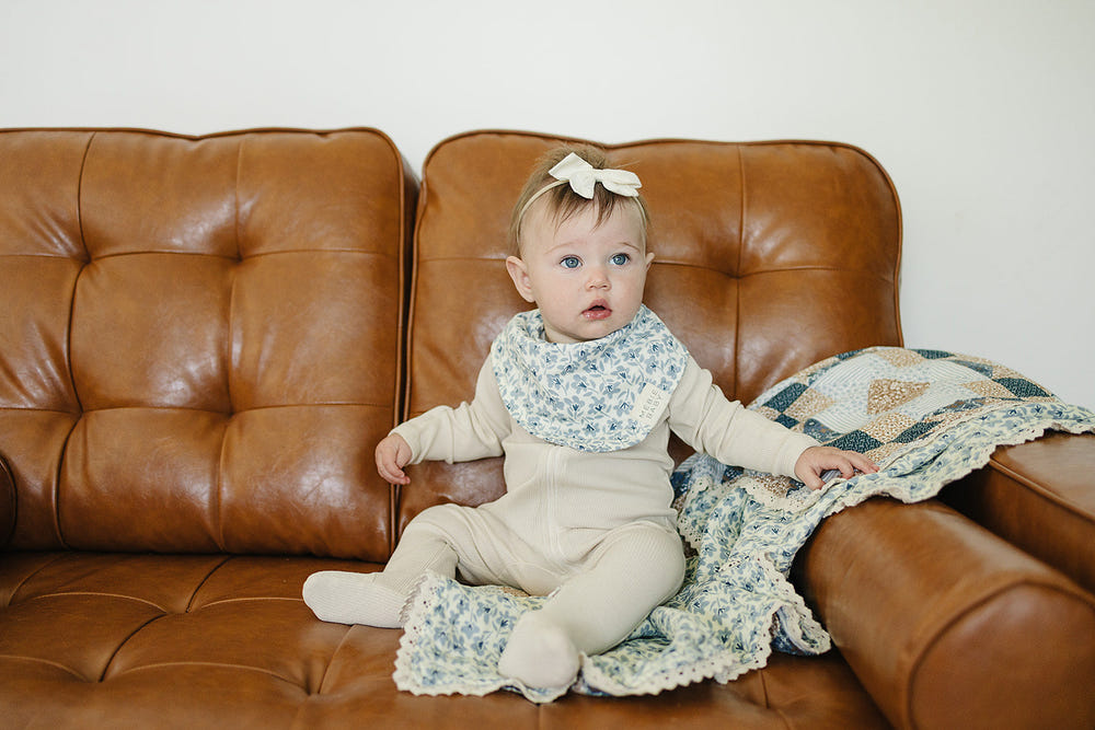 Blue Blossom Classic Muslin Bib for babies, soft and stylish, perfect for mealtime messes.