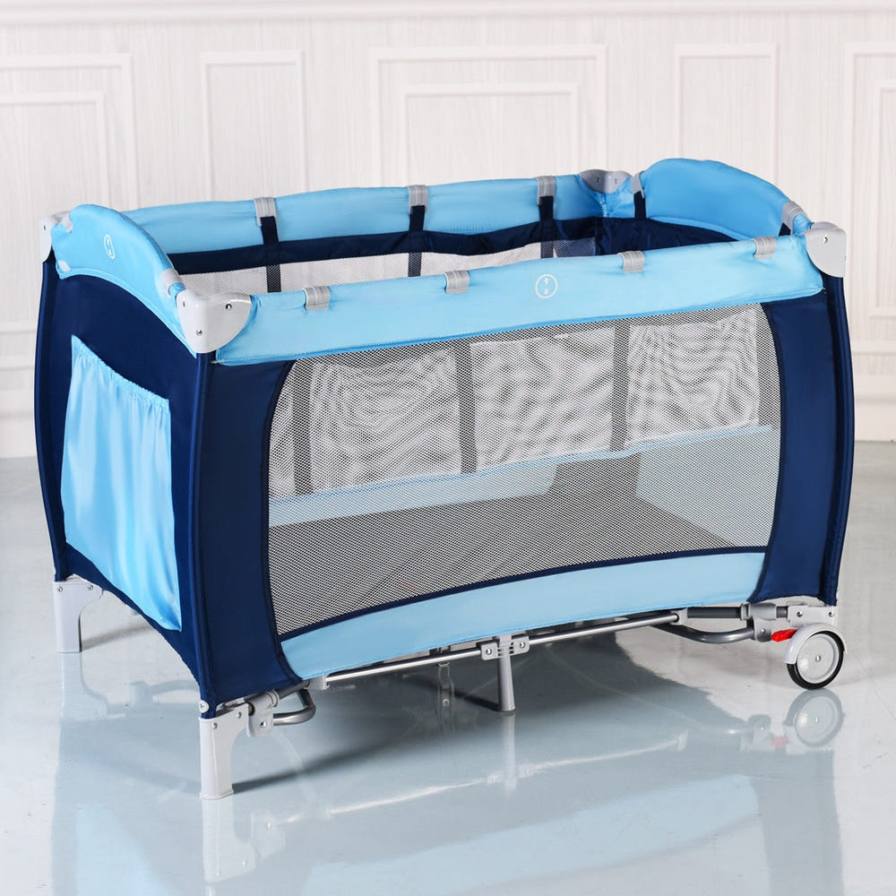 Foldable baby crib playpen with mosquito net and carrying bag, perfect for safe playtime and travel.