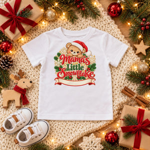 Personalize the Mama's Little Snowflake toddler t-shirt in white with your baby's name