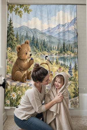 Mom drying her toddler in a hooded towel in front of the Meadow Picnic Camping shower curtain
