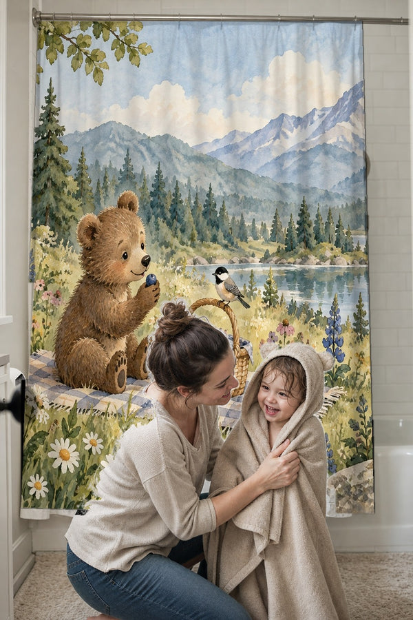 Mom drying her toddler in a hooded towel in front of the Meadow Picnic Camping shower curtain