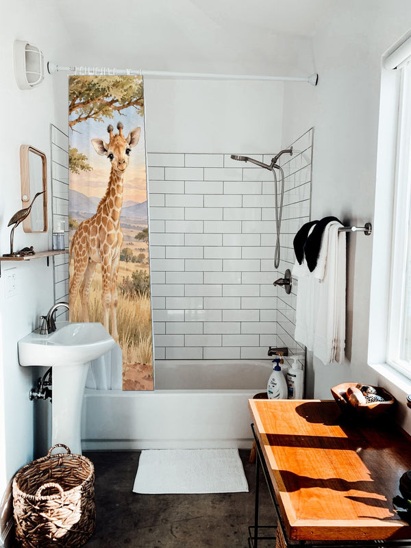 Baby Giraffe Safari shower curtain hanging on the rod over a white bathtub
